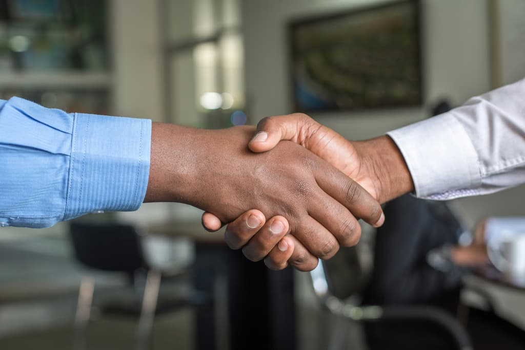 Handshake in a professional office